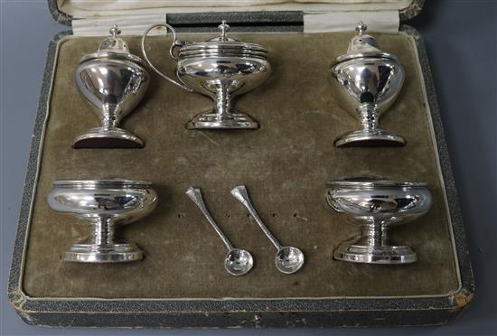 A cased George V silver five piece condiment set, Henry Clifford Davis, Birmingham, 1913/16.